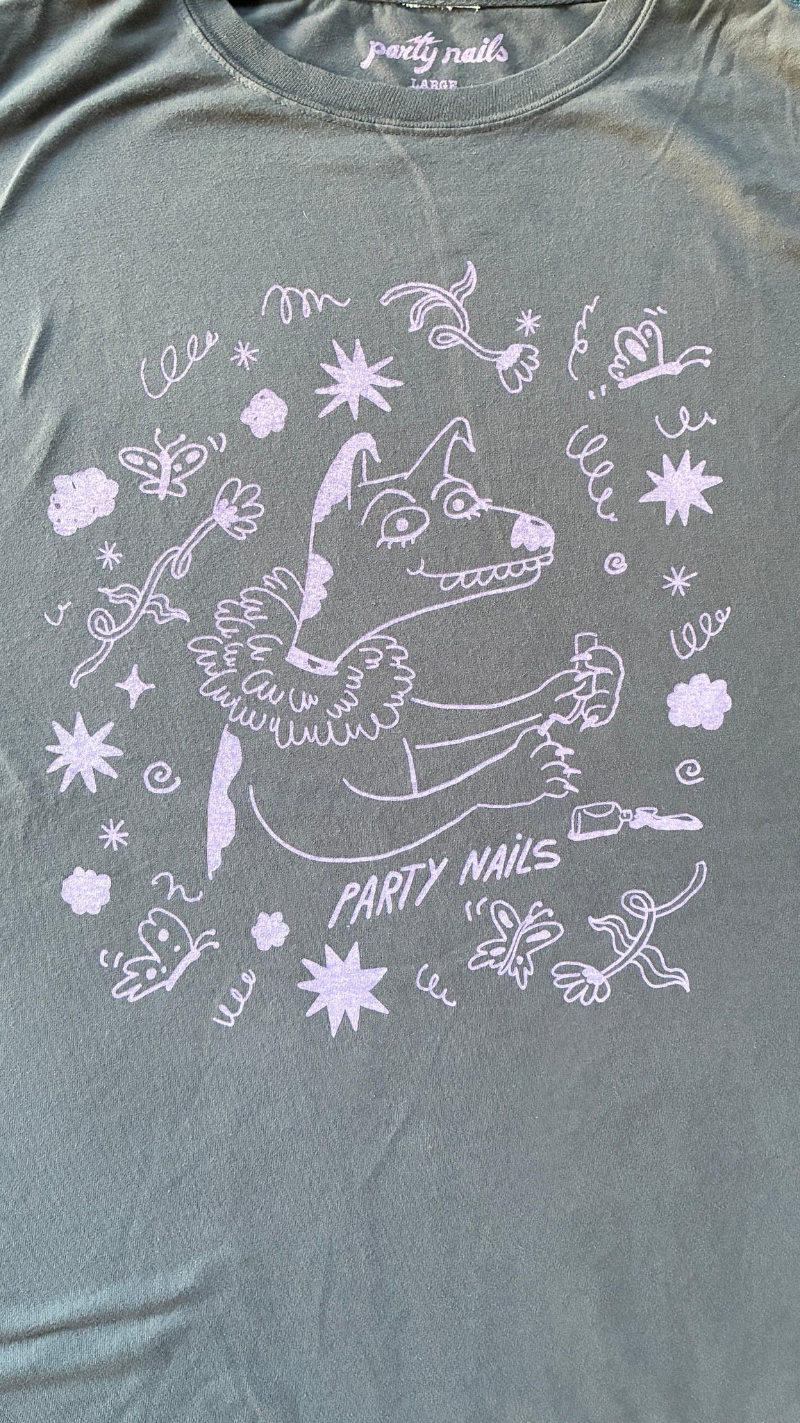 An illustration of Snoopy the dog as a burlesque performer getting ready back stage printed on a t-shirt
